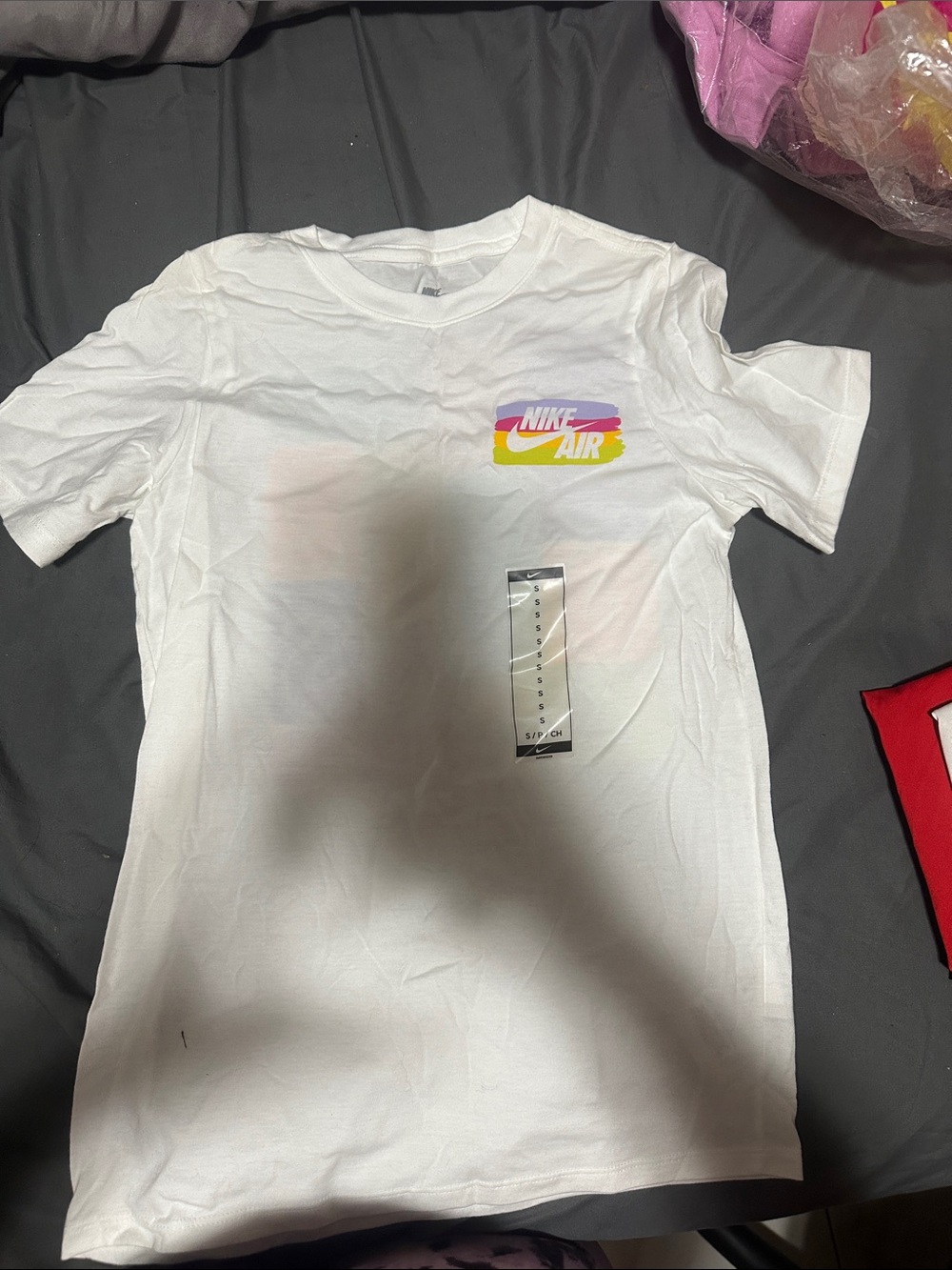 Nike White Tee with Pink, Purple and Yellow Nike Air Logo
